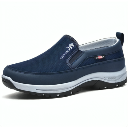 Marinblå ortopedisk slip-on sko för herr med ljusgrå sula och stötdämpande design