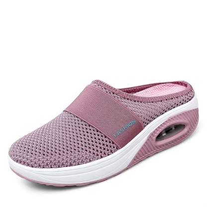 Rosa/lila: Ergonomiska mesh-tofflor med luftkuddesula i rosa – Dam, sedd från sidan