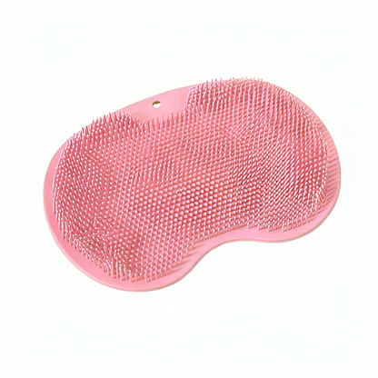 Rosa silikonskrubbmatta med blandade långa och korta mjuka borstar i njurform, produktbild mot vit bakgrund