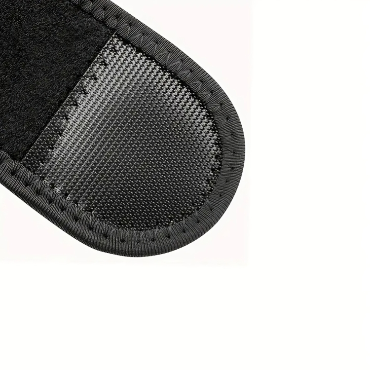 Närbild på axelstödets andningsbara mesh-material och neoprenyta med sömmad kant